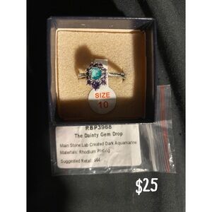 The Dainty Gem Drop Aquamarine and Purple Ring